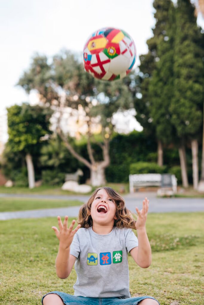 boy playing with football 23 2148263217